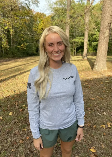 front view of warrior ridge long sleeve gray tshirt on woman