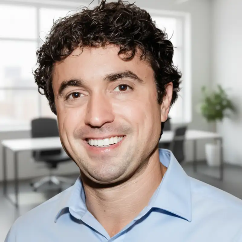 david kemp professional headshot blue shirt